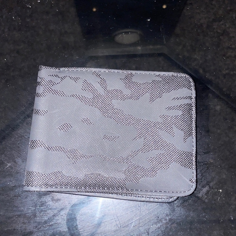 Black members only wallet.